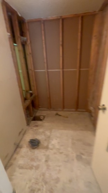 A Freshmens bathroom rehab mid-renovation, down to the studs