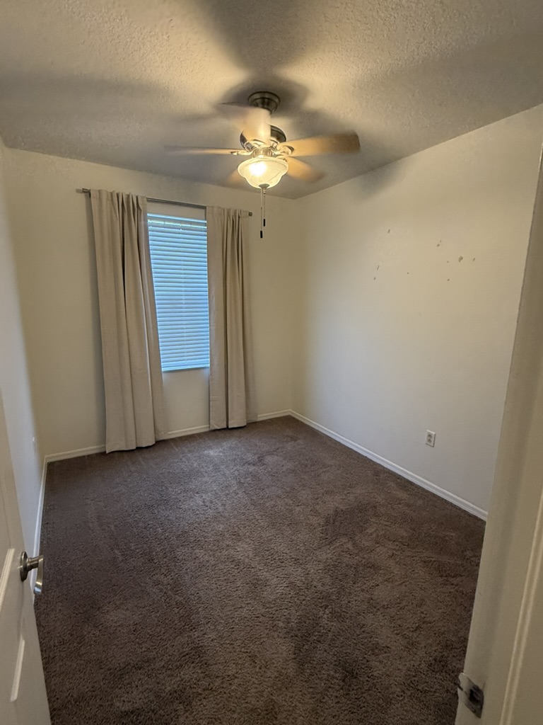 An empty, original bedroom before a Freshmens room-share setup